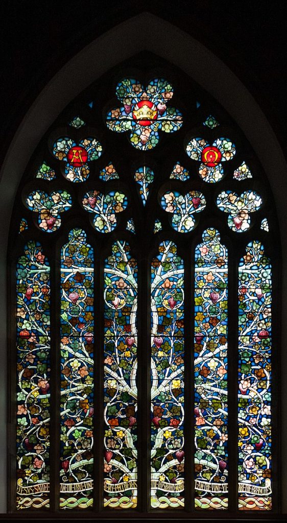 East window in the sanctuary, displaying a huge vine tree and quoting John 15:1,5: ”Jesus said I am the true vine & my father is the husbandman. I am the vine, ye are the branches.” The window was created by Heaton, Butler & Bayne of London.