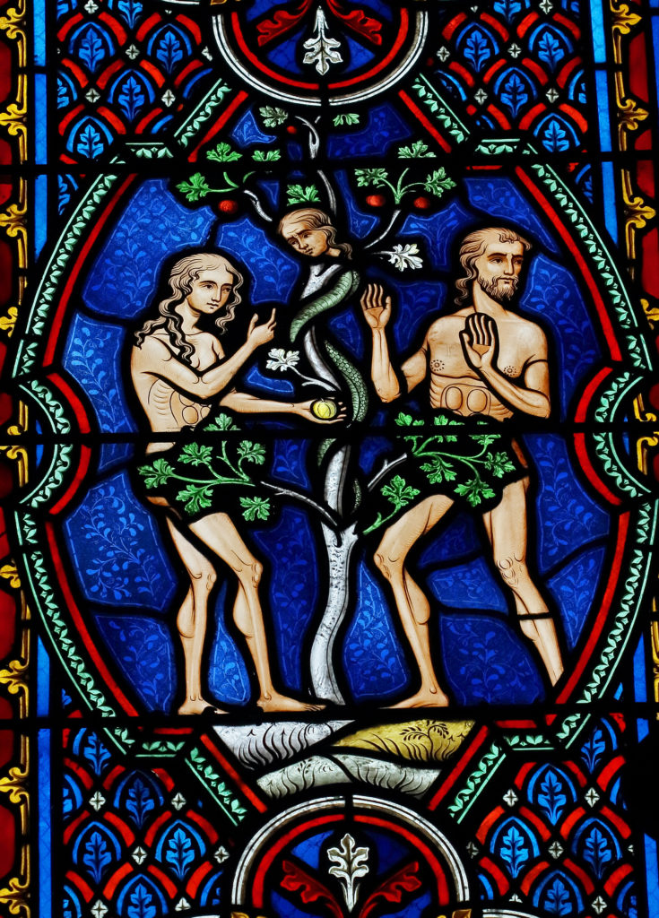 Stained glass, Adam and Eve, and the fruit tree